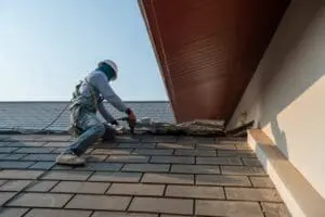 How Long Does a Roof Last? Understanding Roofing Lifespan 1 man preparing the roof