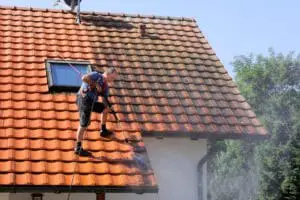 How To Choose a Roofing Contractor: Factors to Consider 1 roofer
