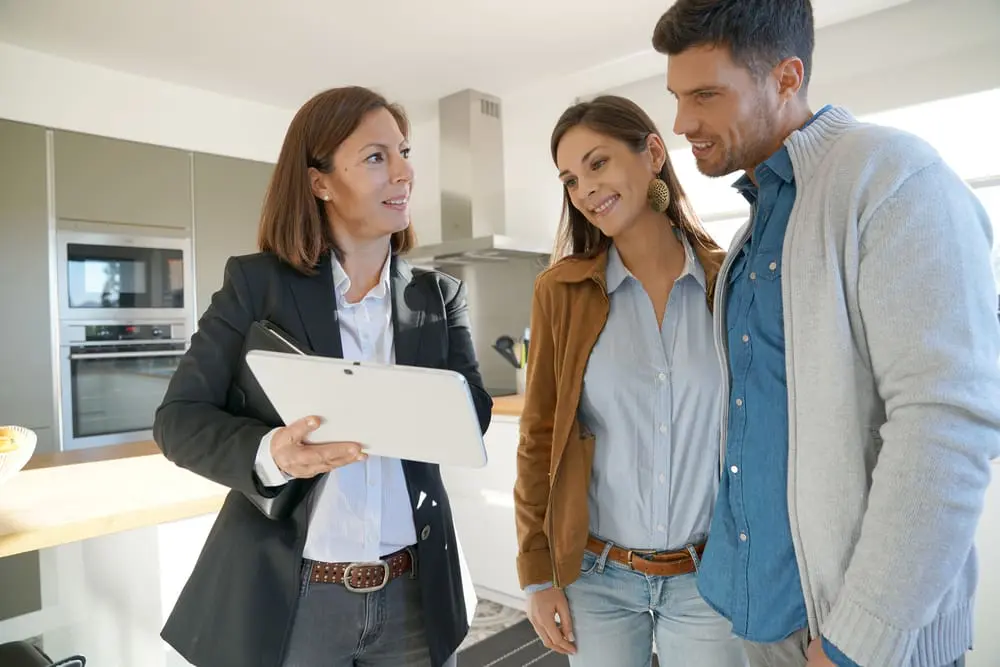representative showing an estimate to prospective clients