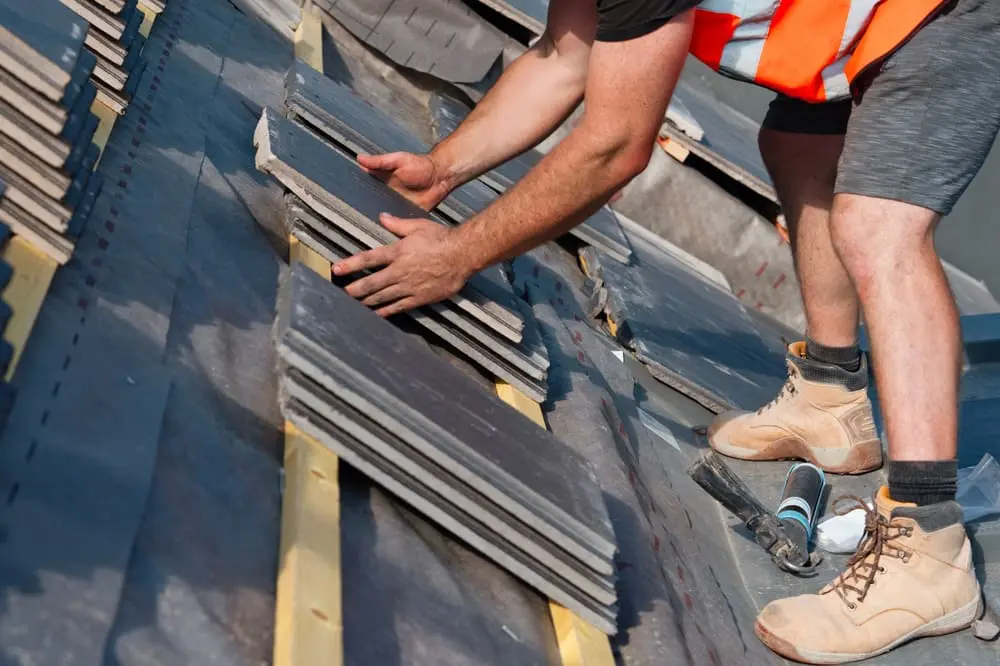 Roofing works in progress on a new tiled roof