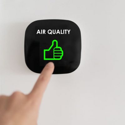 woman checking air quality woman checking air quality